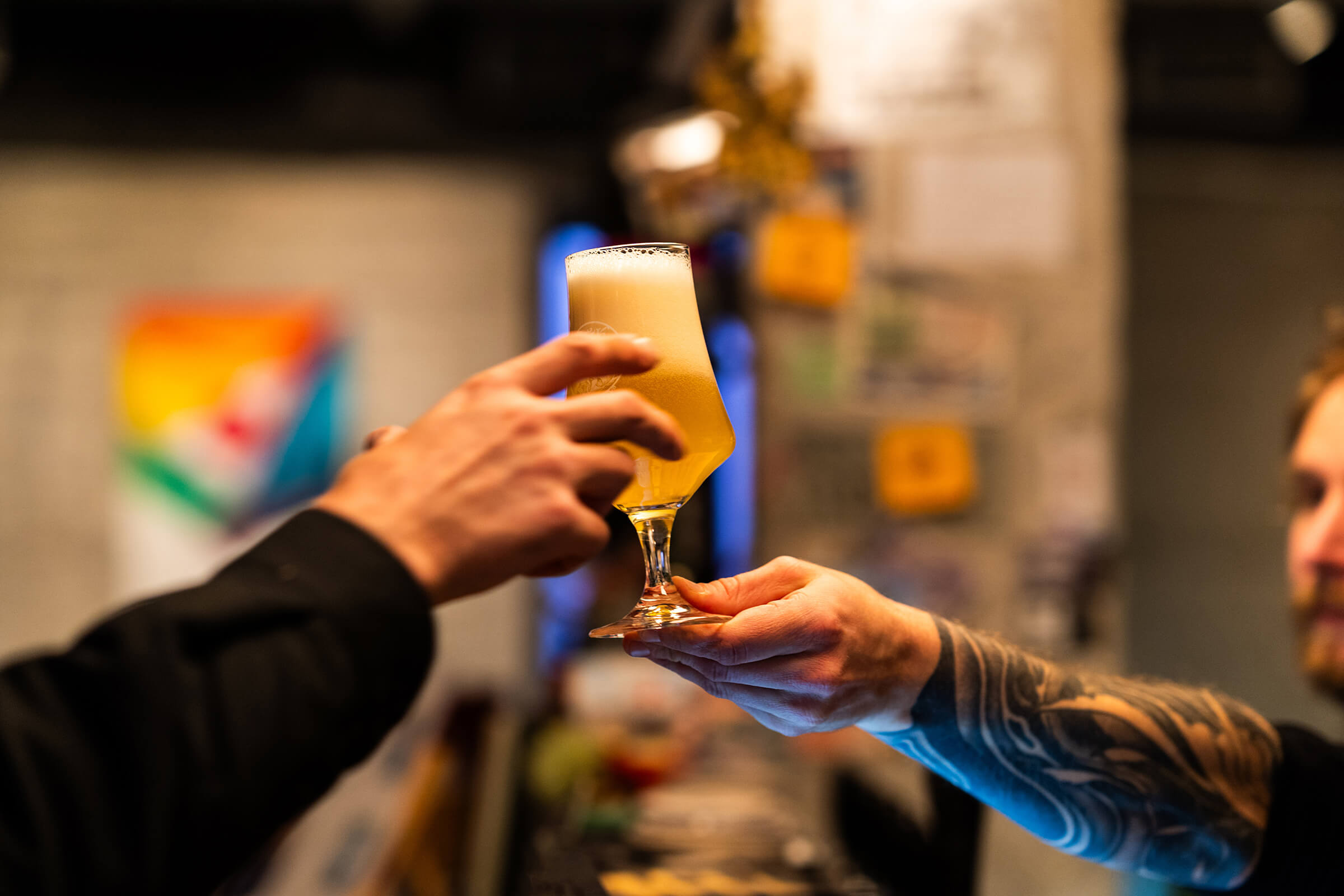 A Folk Hero beer handed across the bar at :Projekt